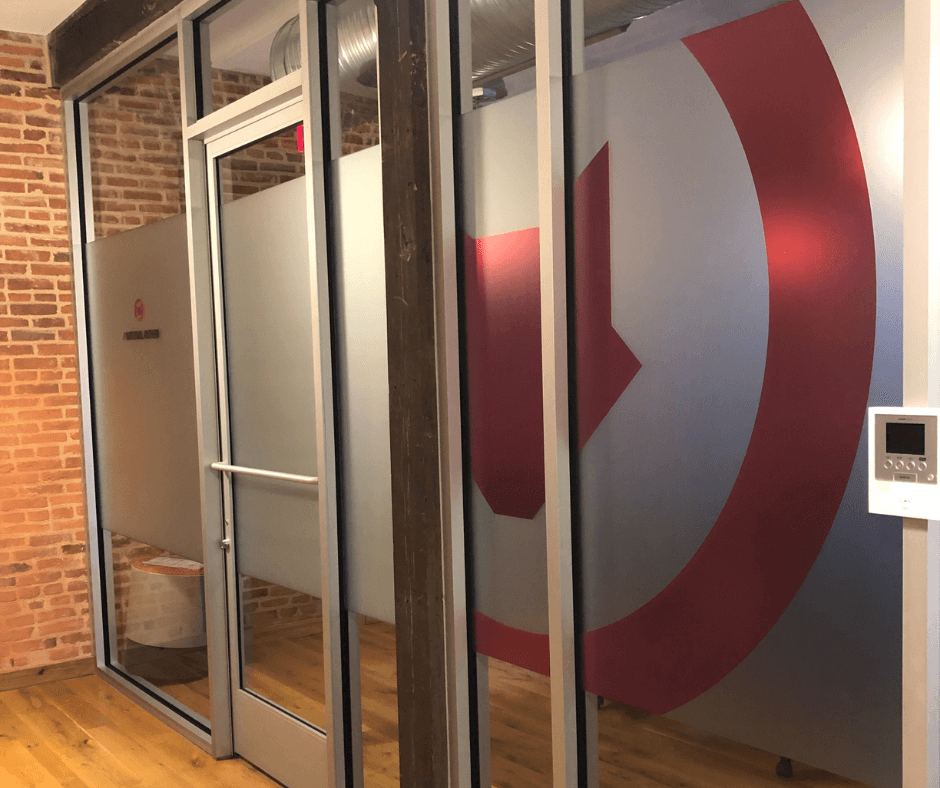 red and white frosted window graphic for commercial office space