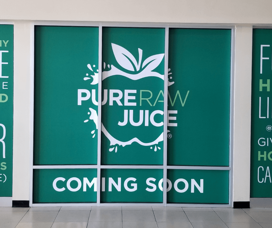 green and white pure raw juice coming soon window graphic